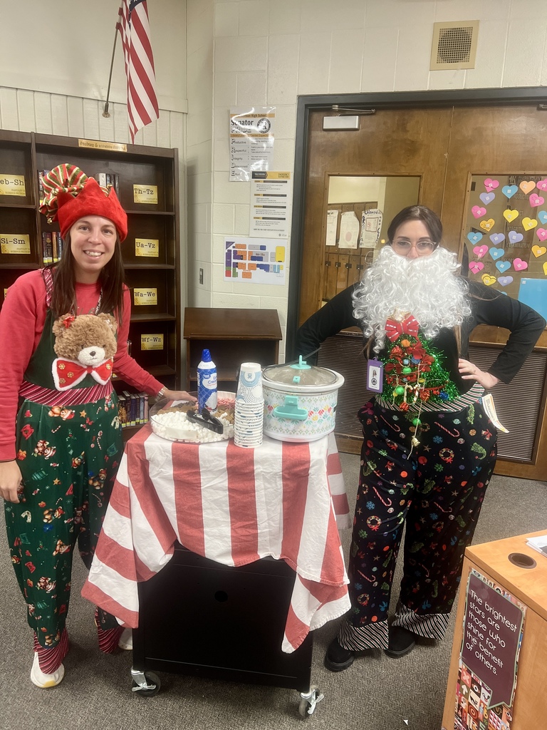 "Life is better with hot choclate!" Coach Nina Hollub and Dr. Casey Grinder served hot cocoa and lots of smiles at RHS today.