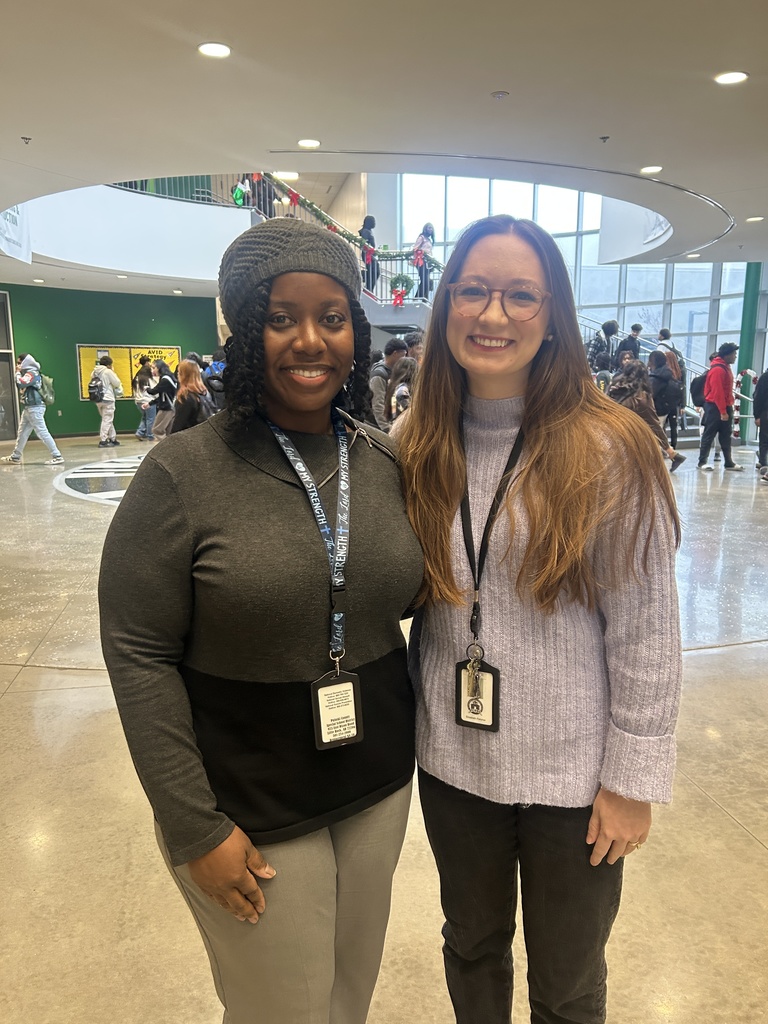 Two teachers in hallway