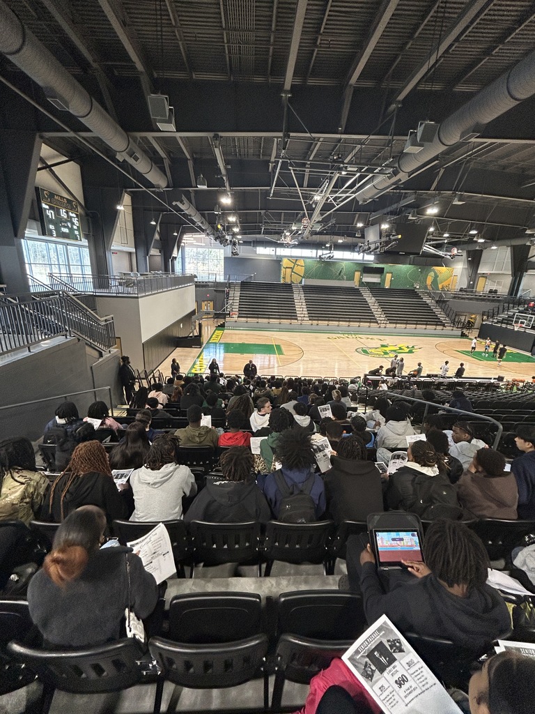 Students in gym bleachers