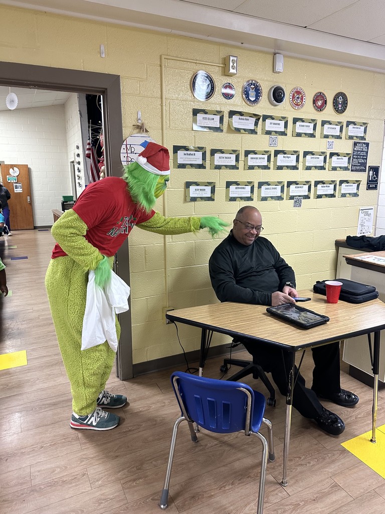 Image of the grinch with Officer Bradford