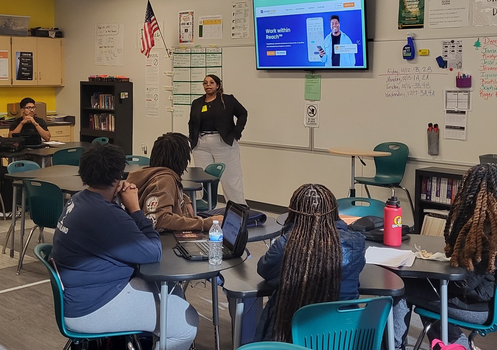 Guest speaker talking to students in classroom