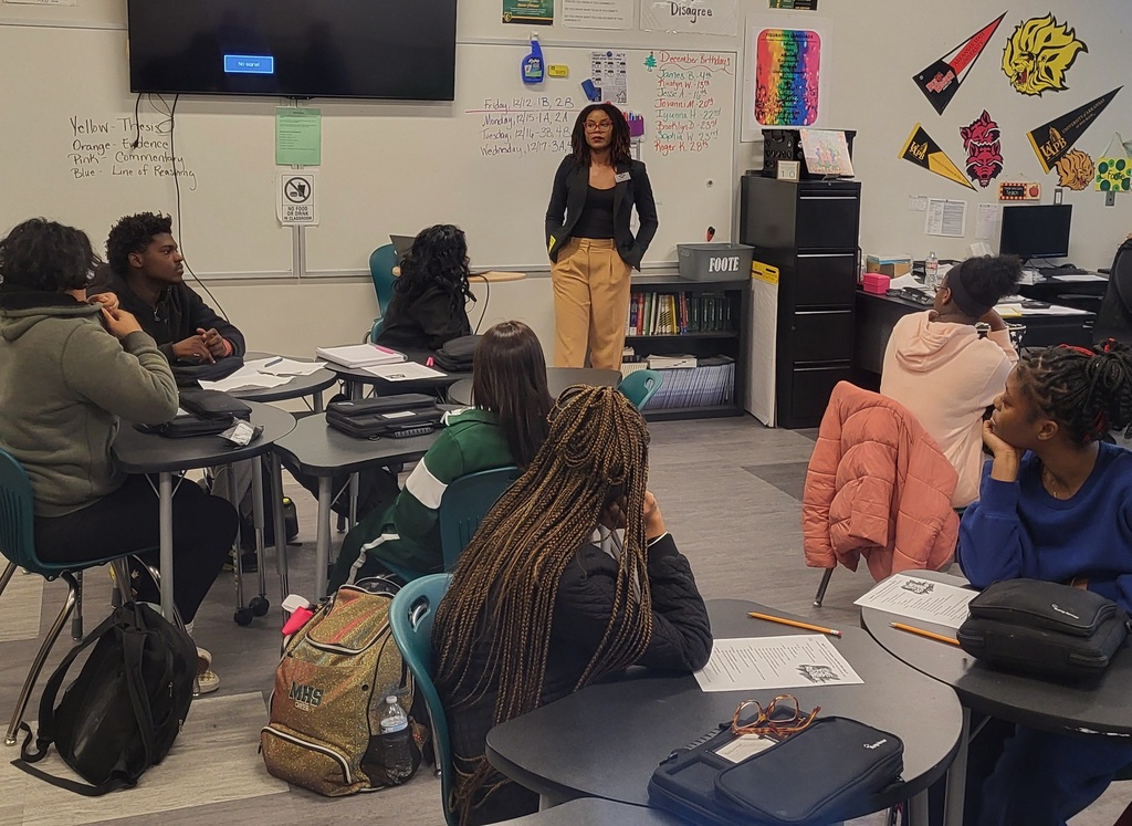 Guest speaker talking to students in classroom