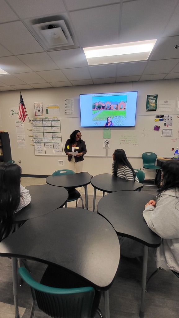 Guest speaker talking to students in classroom