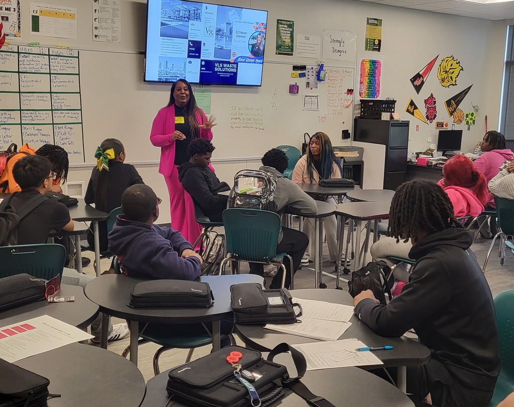 Guest speaker talking to students in classroom