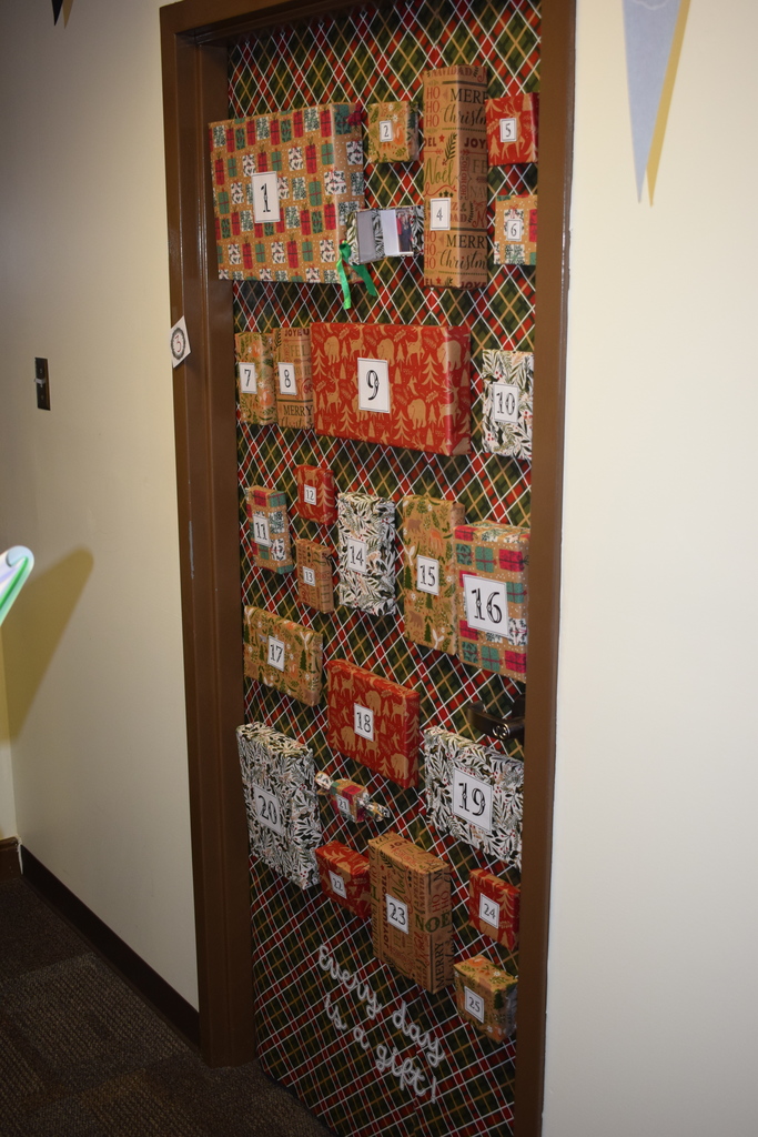 Holiday door decorated as advent calendar