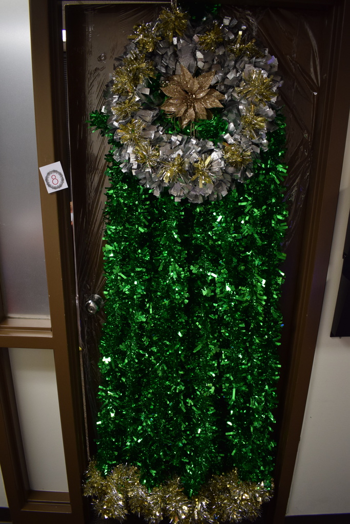 Holiday door decorated as a tinsel tree