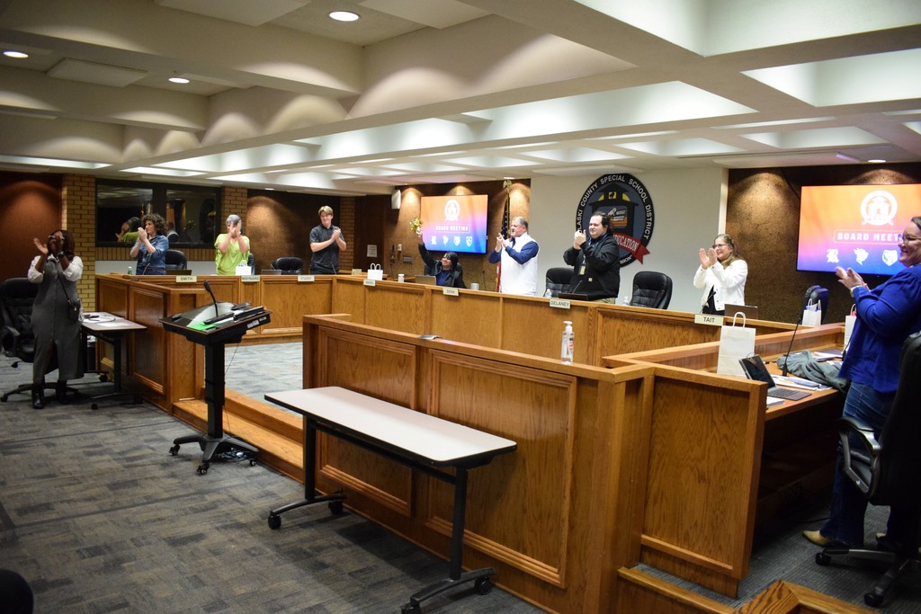 Standing ovation during a board meeting