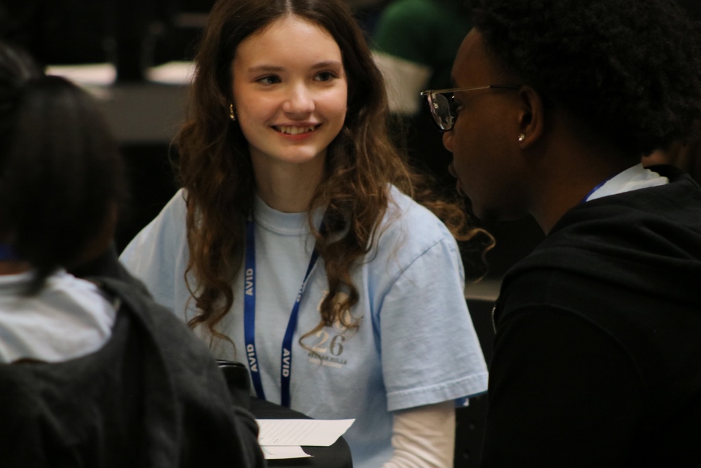 Students smiling as they talk