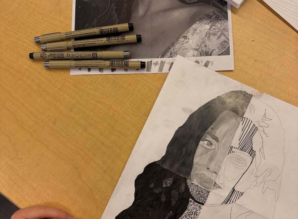 A partially completed celebrity portrait