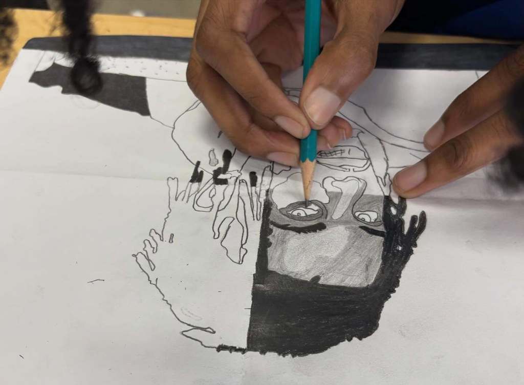 A partially completed celebrity portrait