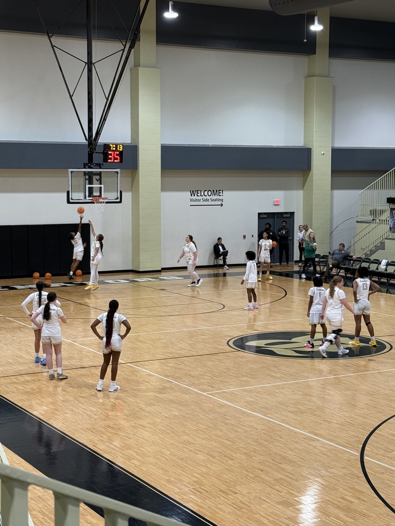 Cheerleaders at the RHS basketball game vs. Benton High School & Varsity Girls warming up ahead of the game. 
