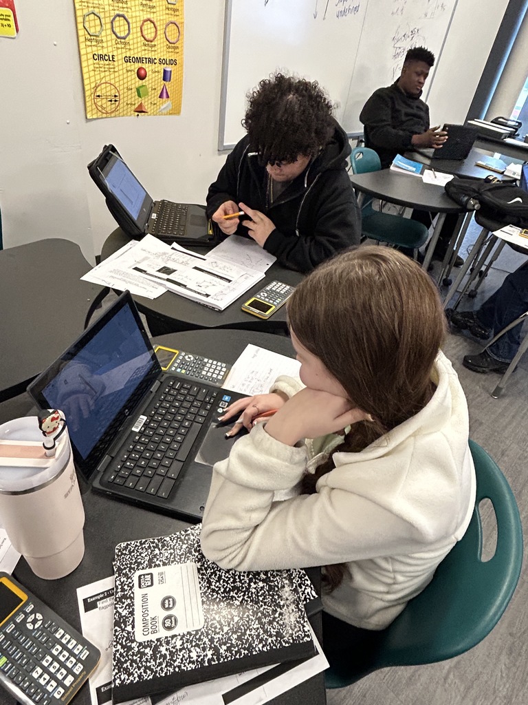 students doing work on math homework