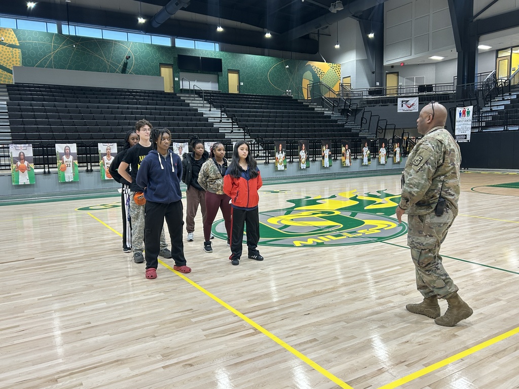 JROTC students practicing with their sergeant