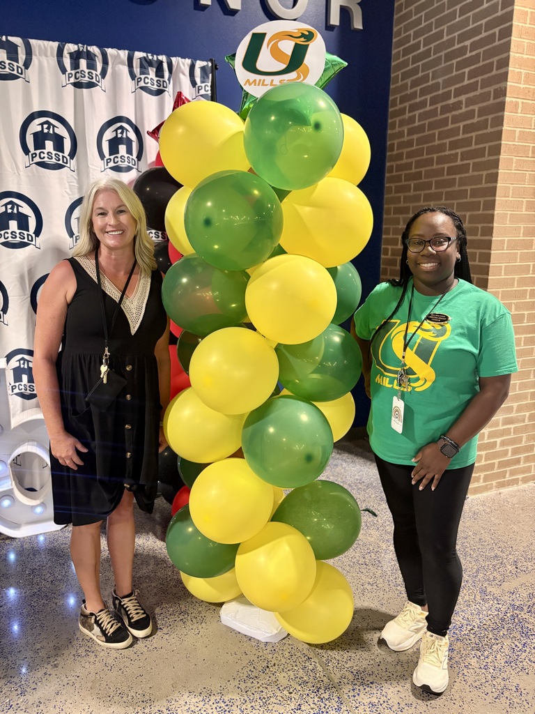 School counselors with a balloon tower