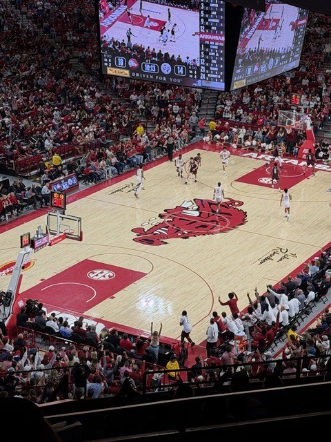The basketball court at Bud Walton Arena packed with fans