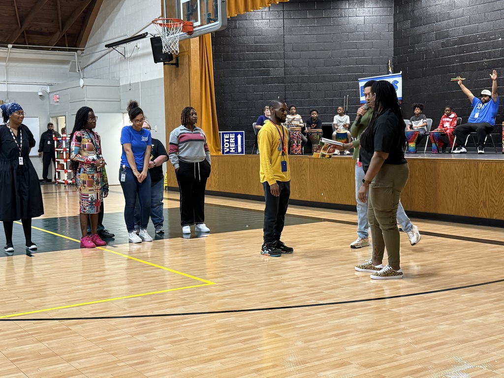 Drum line and a group of characters from the story.