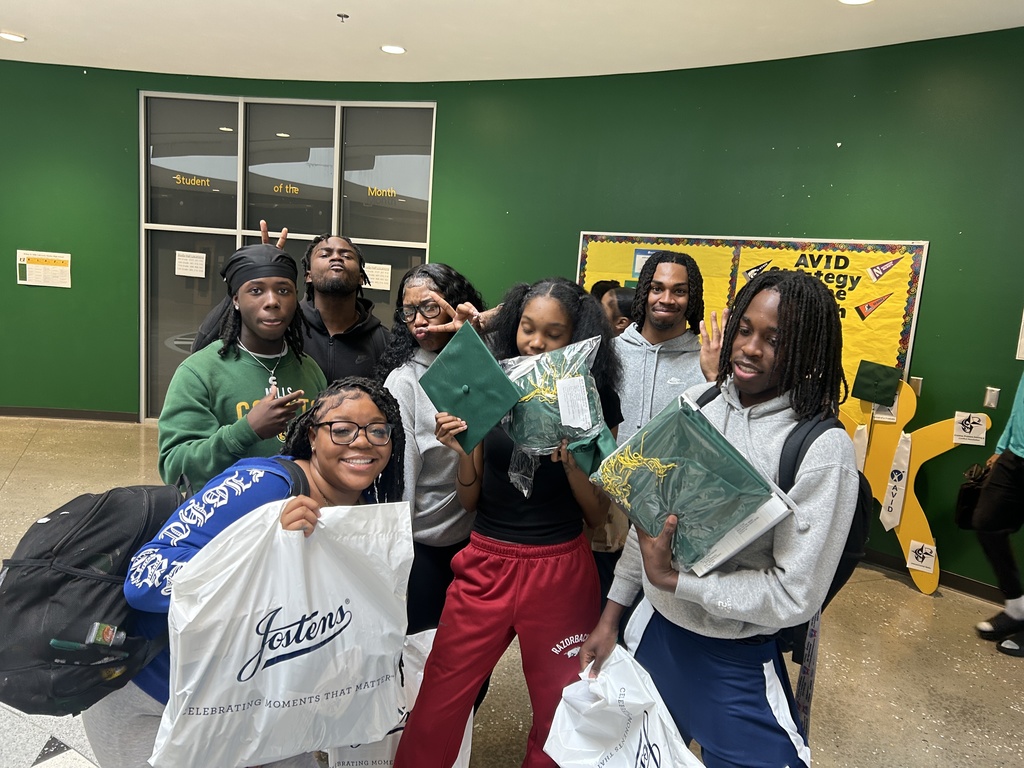 Seniors showing off caps and gowns