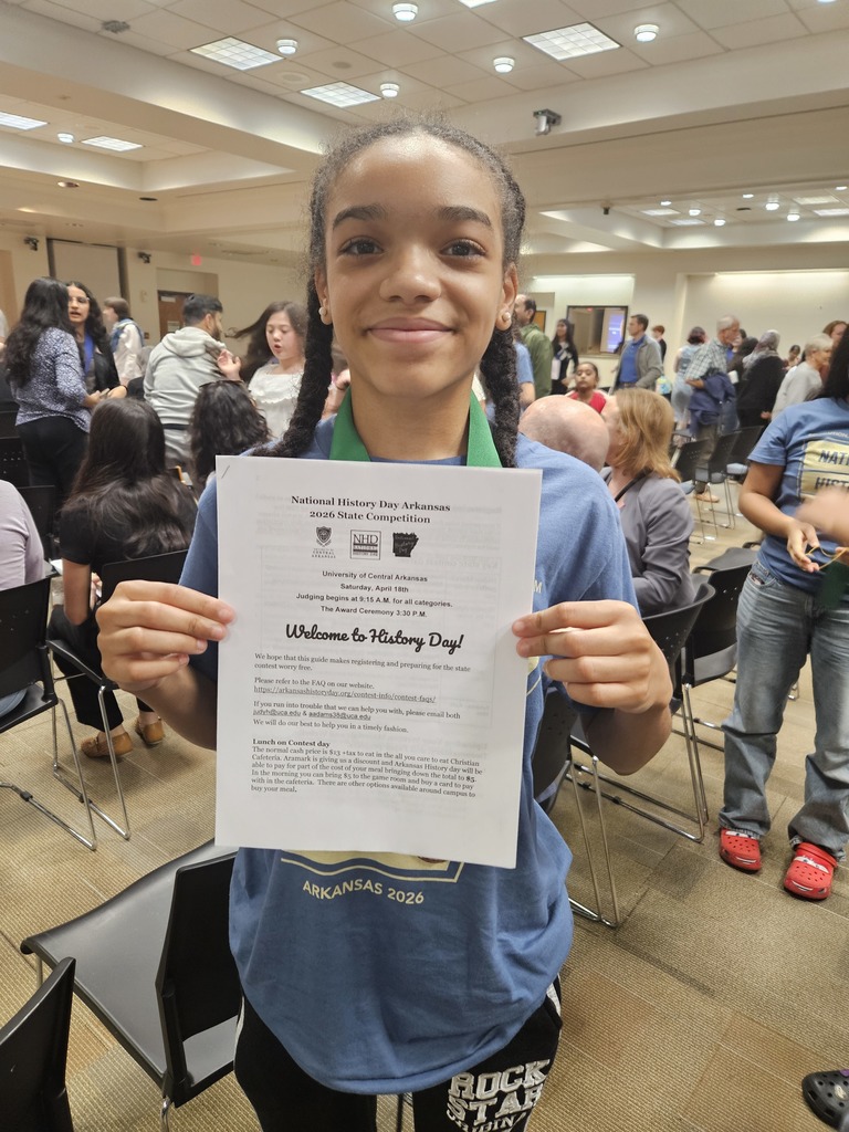 Kaley Holt holds 3rd place winner certificate