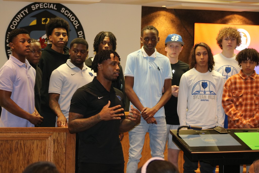 Sylvan Hills Jr. High Basketball team at the PCSSD board meeting