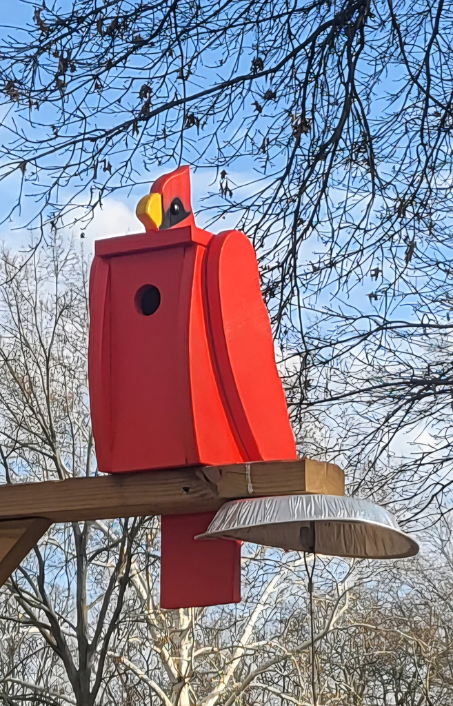 Bright red birdhouse created by RHS students