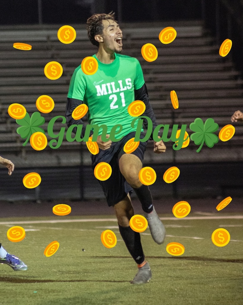 A Mills soccer player wearing jersey number 21 celebrates on the field with cartoon gold coins and “Game Day” text with shamrocks added to the image.