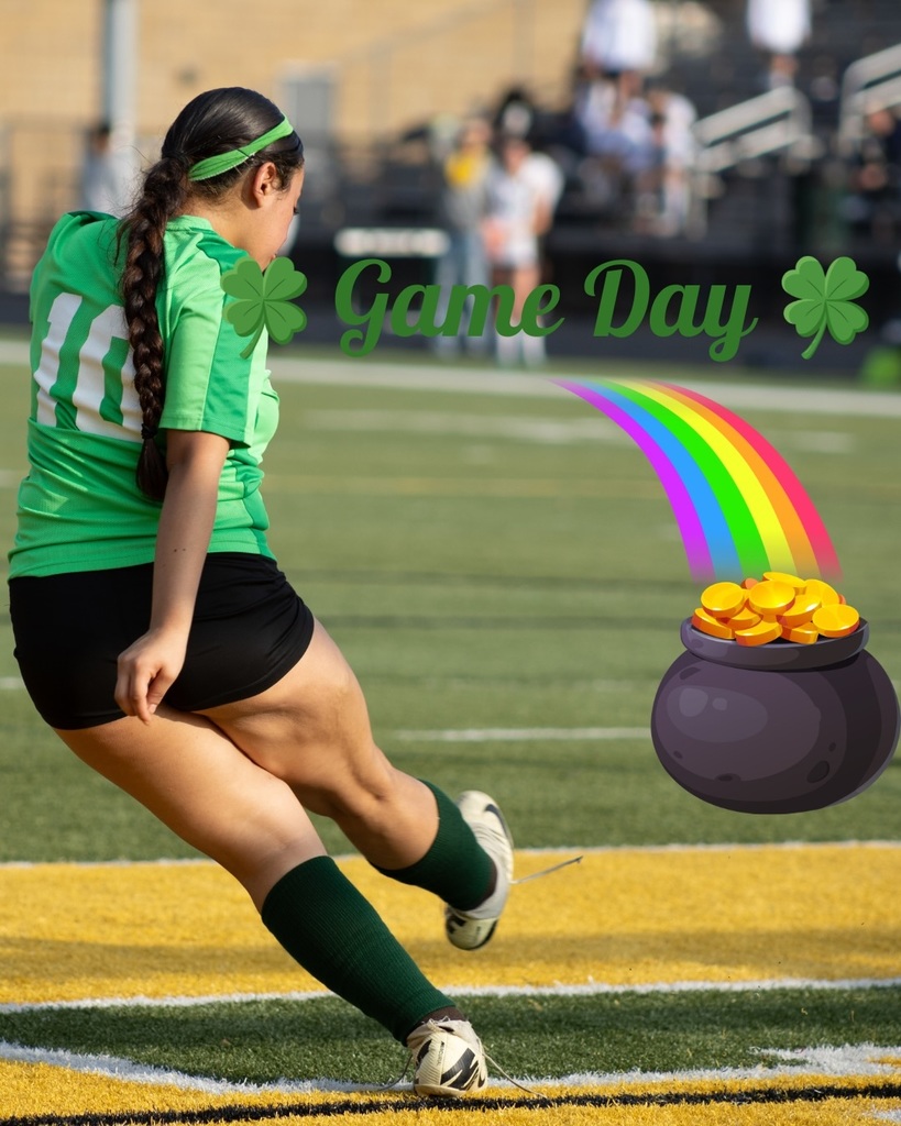 A Mills soccer player wearing jersey number 10 kicks the ball during a game. “Game Day” with shamrocks and a rainbow‑to‑gold graphic are added.