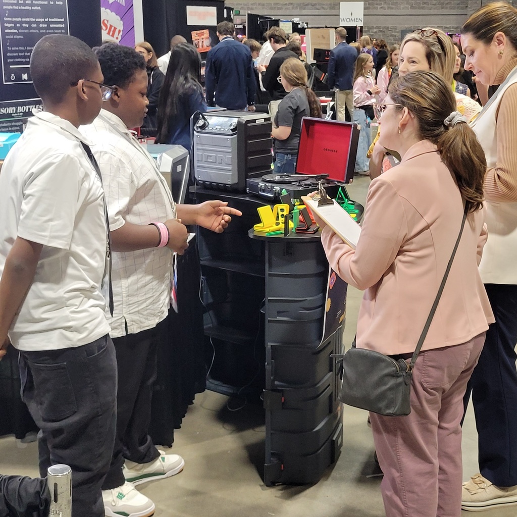 Judges coming around to ask questions of Dwight and Marcus at the East Conference