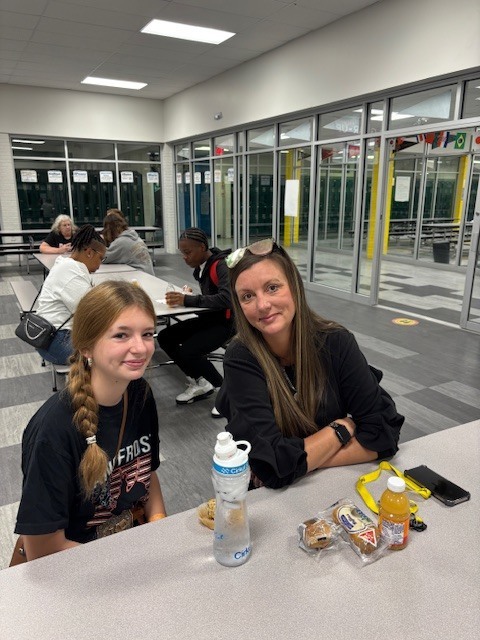 Girl with french braids and mom