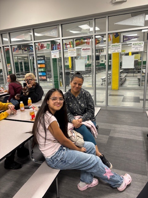 girl in pink and mom