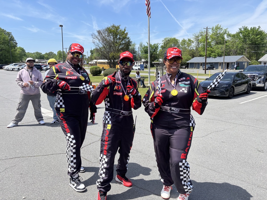 Mrs. Evans, Ms. Warren, and Coach Mac are ready to GO!