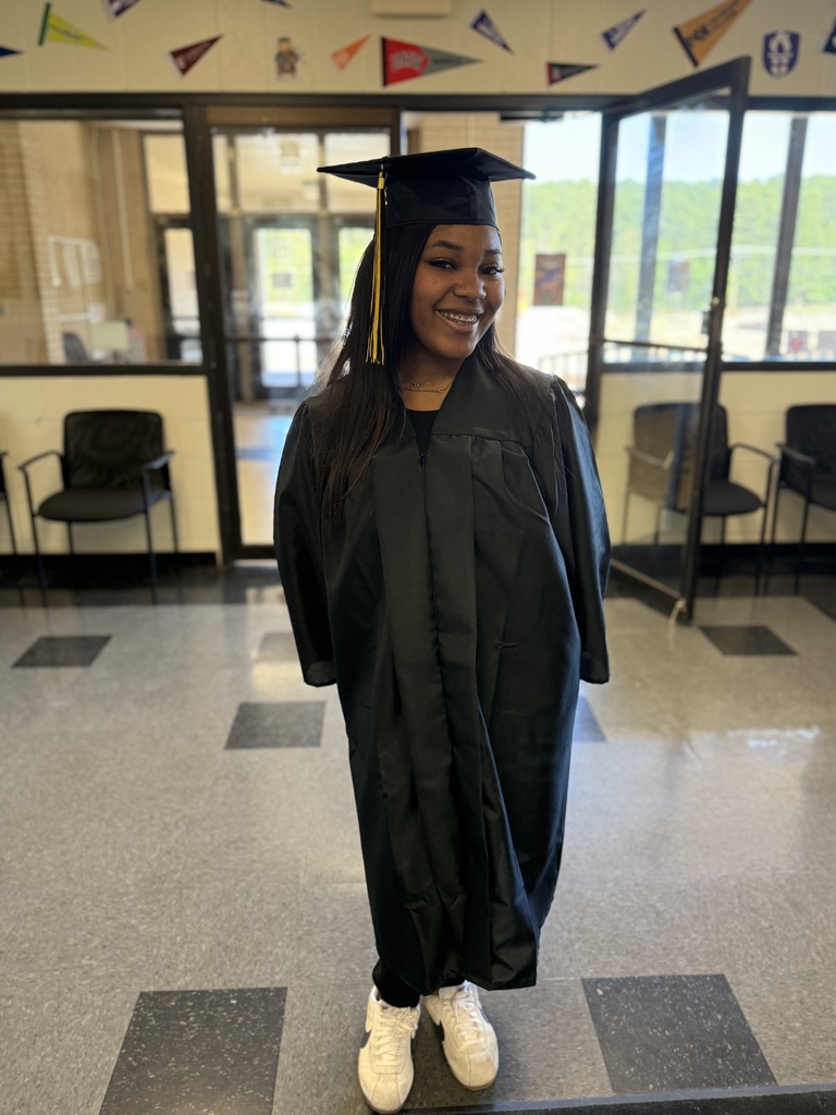 RHS student in her cap and gown.  It's a perfect fit! Graduation is right around the corner, and the excitement is building every day.