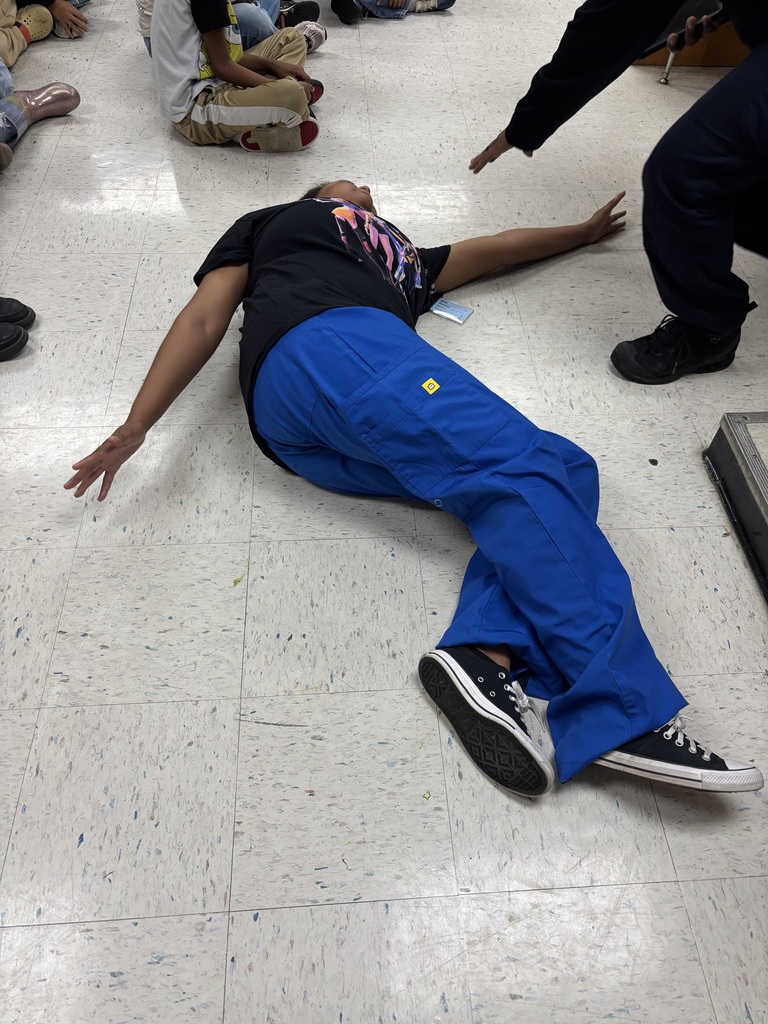 Ms. Phillips pretended to be a victim so that EMS could show the students what would happen in an emergency!