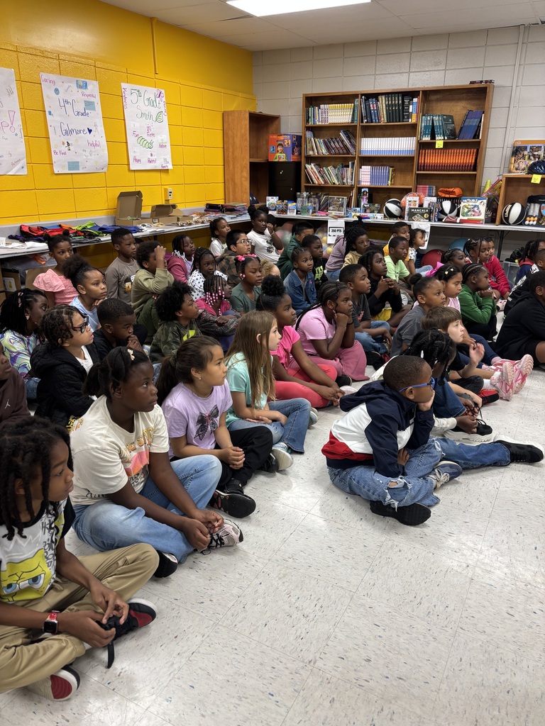 Listening intently to the presentation.