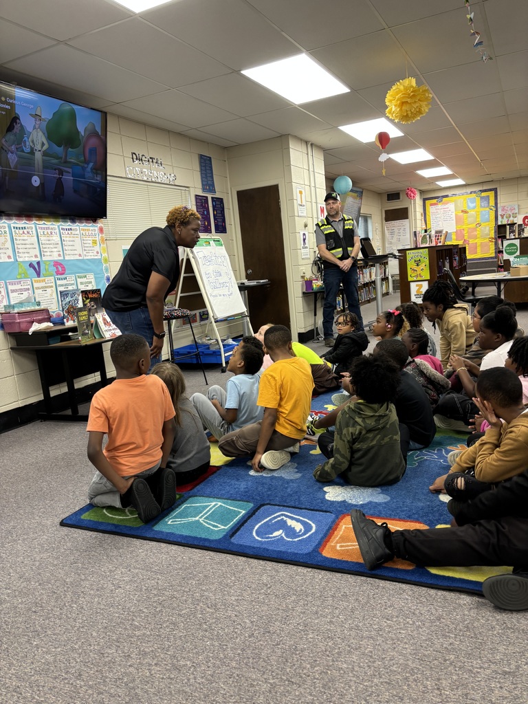 Listening intently to the presentation.