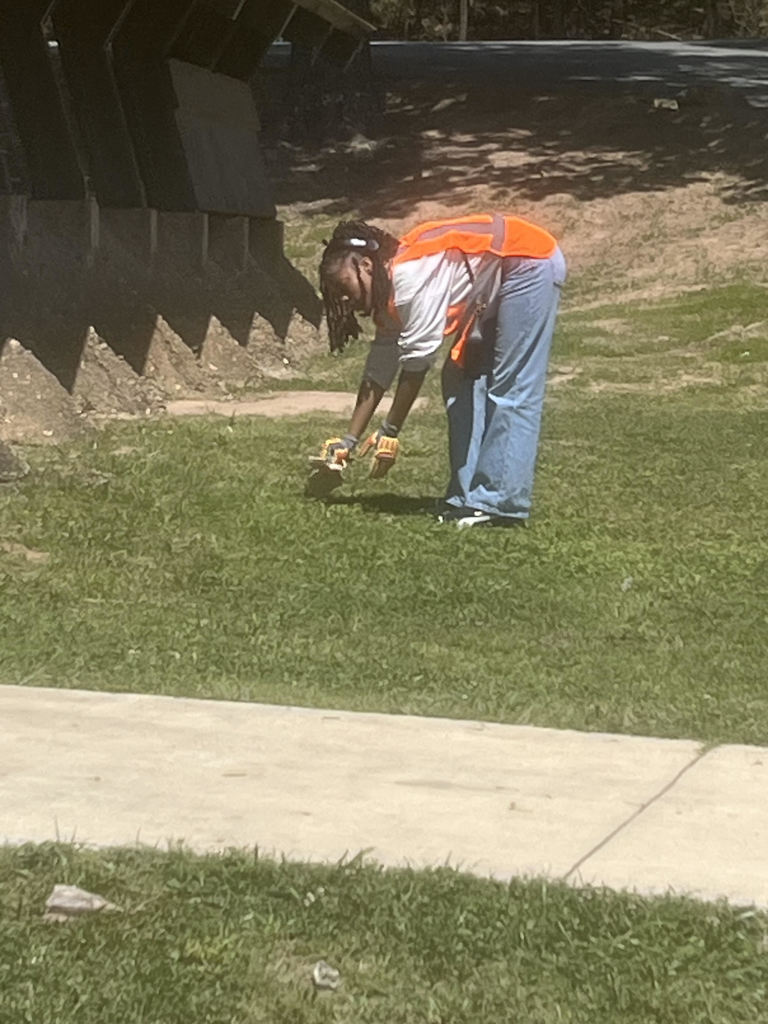 Student picking up trash