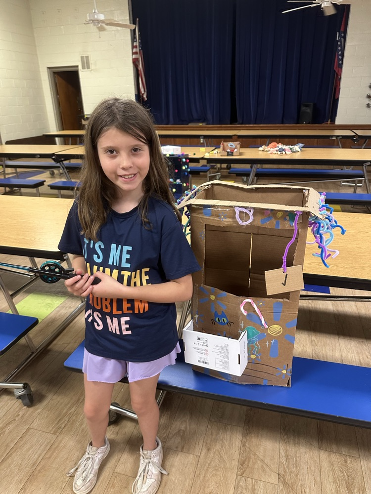 4th grade student with her claw machine