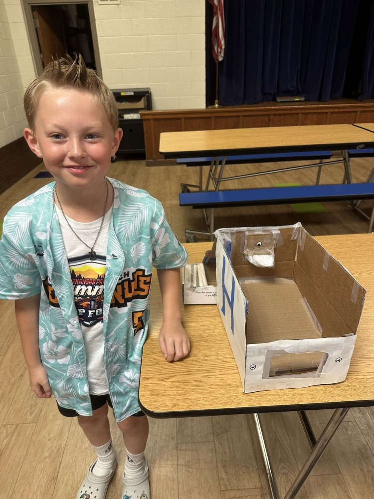 3rd grade student with his basketball game
