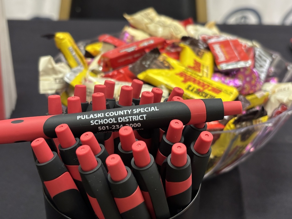 Pens at a table 