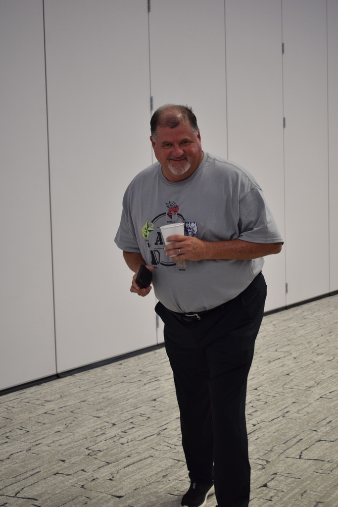 superintendent Jeff Senn smiling and about to walk