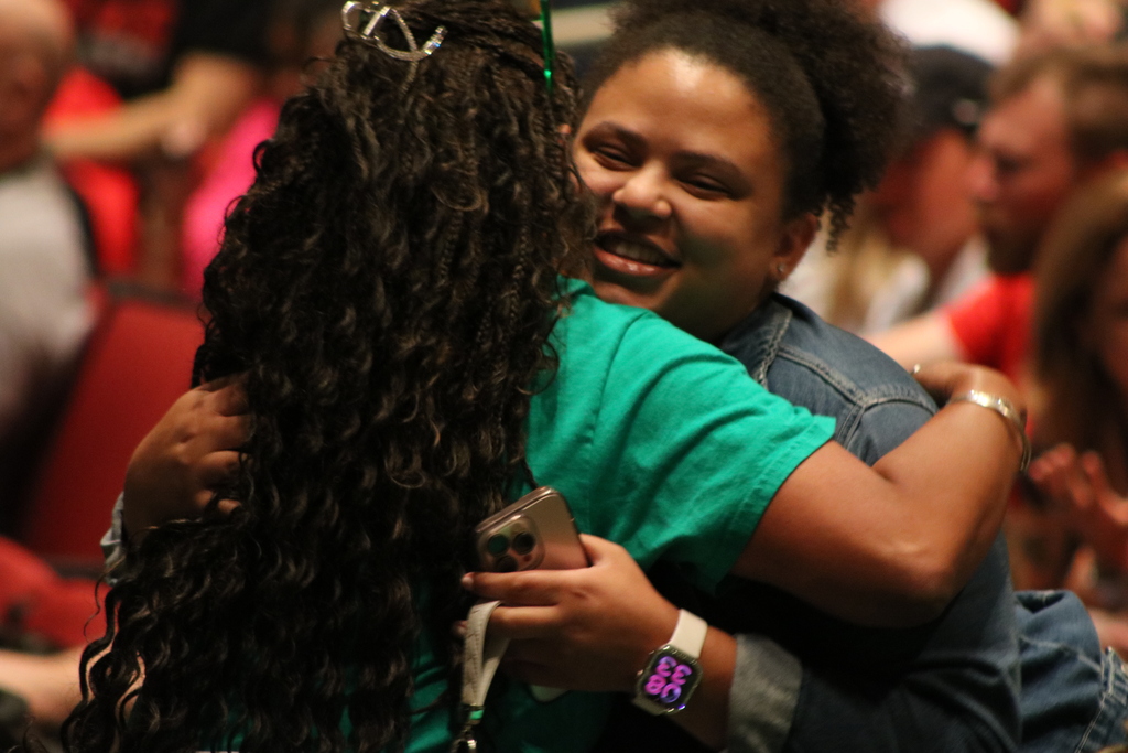 Two people hugging