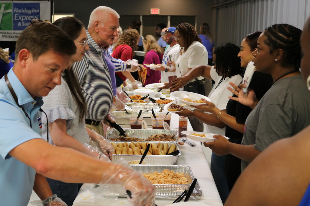 A picture of a food service line.