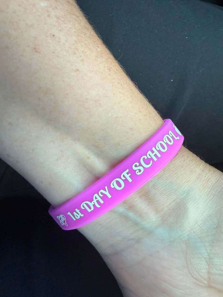 A pink 1st day of school bracelet