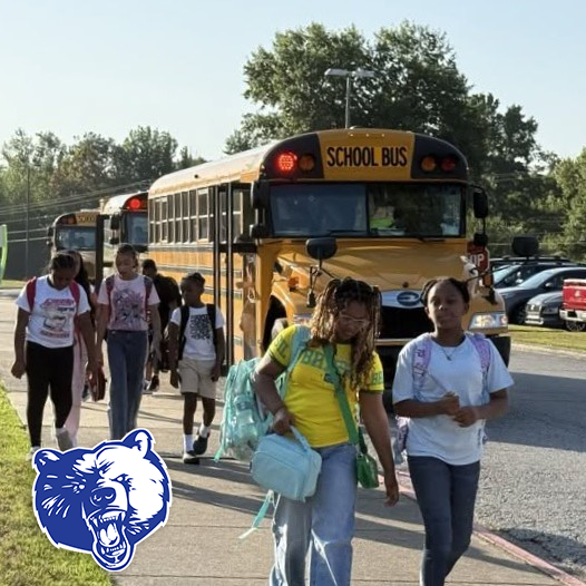 A school bus dropping off students