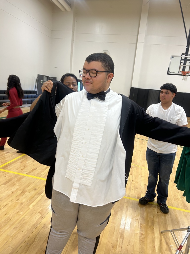 Student trying on tuxedo