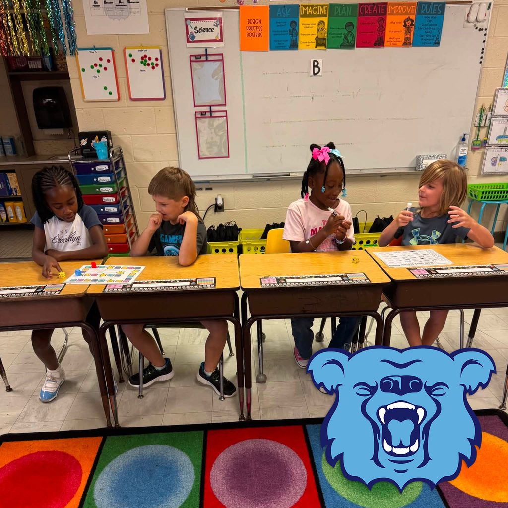 Students learning at a table