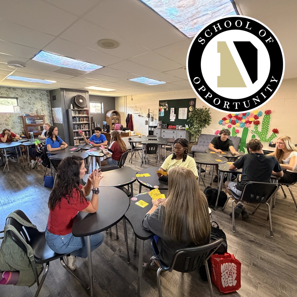 A classroom full of learning high school students
