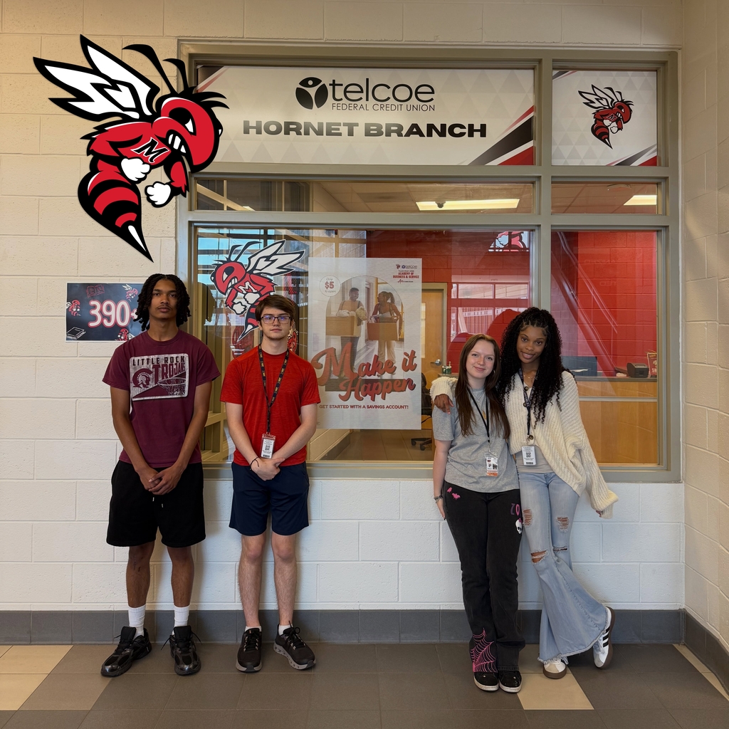 students stand in front of a Hornet Branch bank
