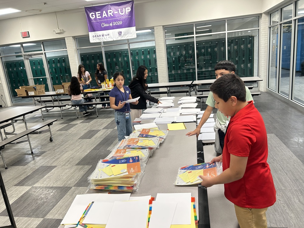 Pic of AVID/AVID Excel scholars setting up binders for school wide launch