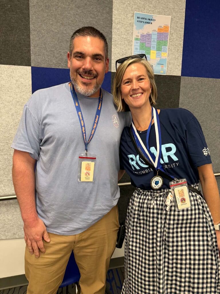 Mrs. Pulliam receives the "I Build Champions" award for August 2026.  