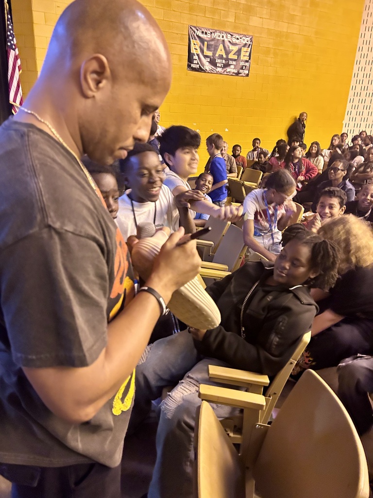 MMS Scholars getting Kyle Greene's autograph